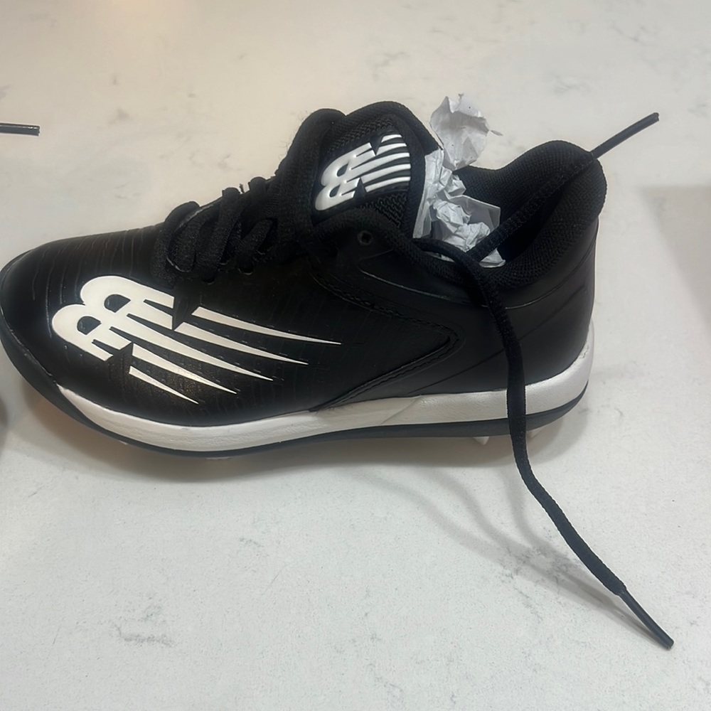 Brand new boys cleats. We bought two pair and did not use these.